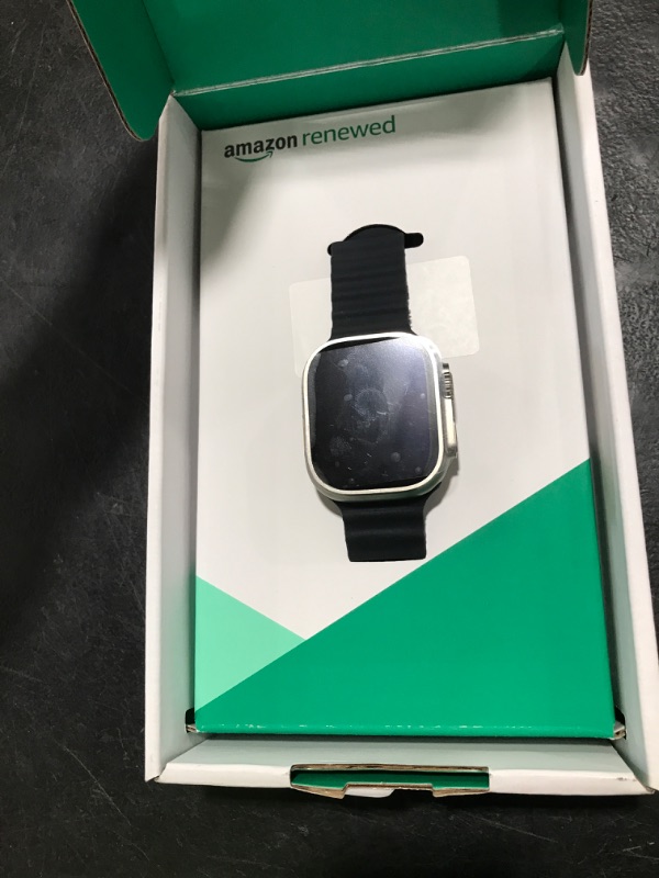 Photo 1 of Apple Watch Ultra [GPS + Cellular 49mm] Titanium Case with Midnight Ocean Band, One Size (Renewed Premium)