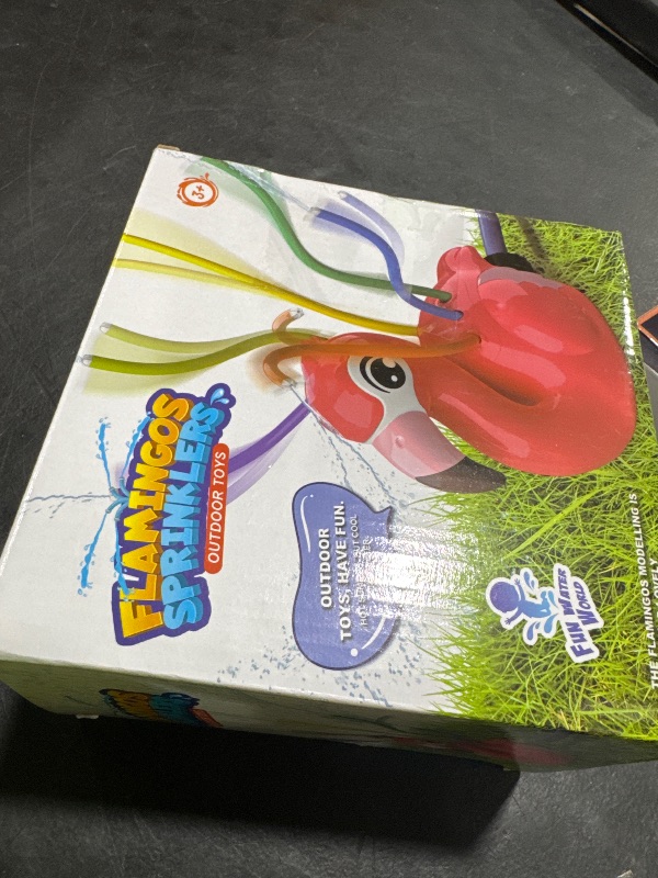 Photo 1 of 2-in-1 Water Sprinkler Toys for Kids and Aldult,Outdoor Garden Lawn Watering Toys with Water Tentacles,Attaches to Garden Hose,Summer Spray Water Fun Toys (Flamingo)