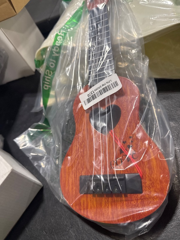 Photo 1 of YEZI Kids Toy Classical Ukulele Guitar Musical Instrument, Brown