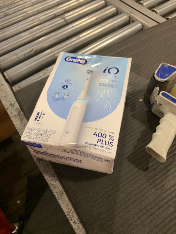 Photo 1 of Oral-B iO Deep Clean Rechargeable Electric Powered Toothbrush, White with iO Series 3 Limited, 2 Brush Heads and Travel Case - Pressure Sensor to Protect Gums - 3 Cleaning Settings - 2 Minute Timer