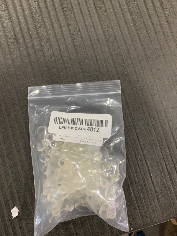 Photo 1 of PHITUODA 50 Pack Small Suction Cups 20mm, Suction Cups with Holes for Glass Table Tops,Prevent Table Tops Sliding and Home Decoration