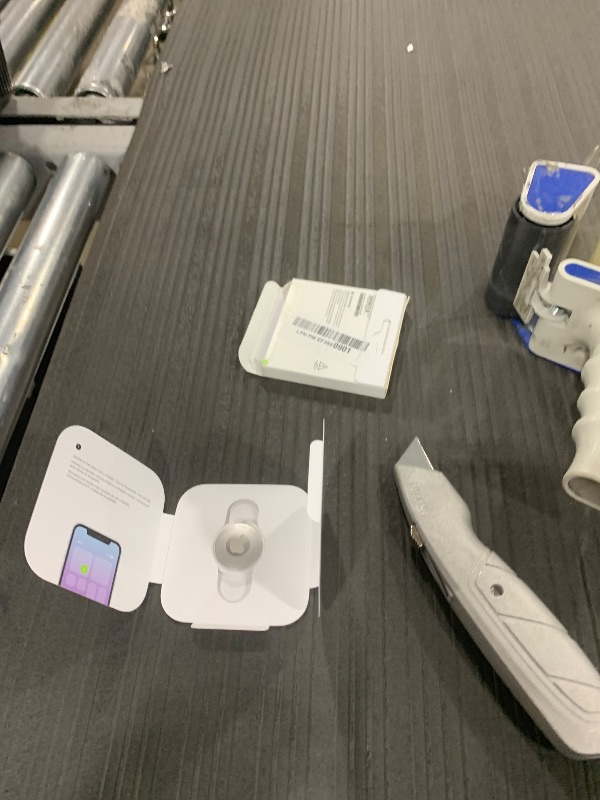 Photo 1 of Apple AirTag. Keep Track of and find Your Keys, Wallet, Luggage, Backpack, and More. Simple one-tap Set up with iPhone or iPad