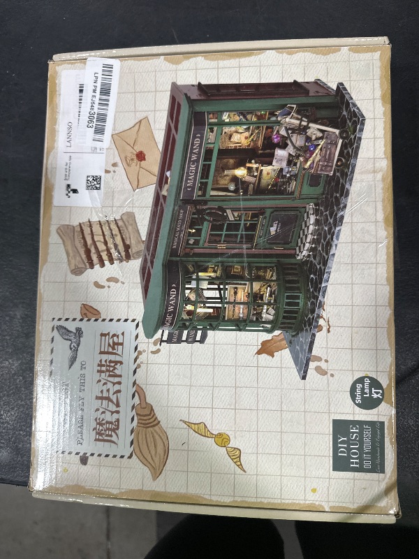 Photo 1 of Lannso DIY Dollhouse Miniature Kit, Doll House Kit with Dust Proof Cover, Magic Wand Shop, Mini Handmade Wooden Dollhouse Toys for Adult Gift(F32)