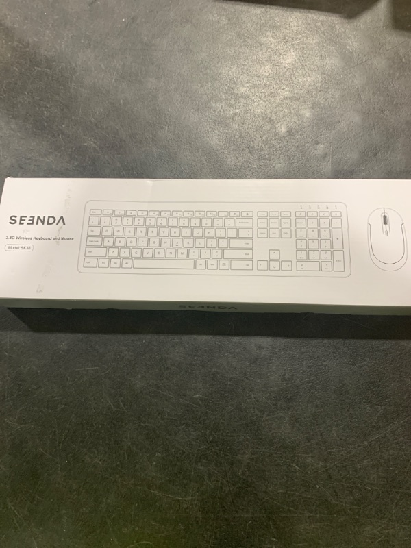 Photo 1 of Wireless Keyboard and Mouse Combo - Full Size Slim Thin Wireless Keyboard Mouse with Numeric Keypad 2.4G Stable Connection Adjustable DPI (White & Silver)