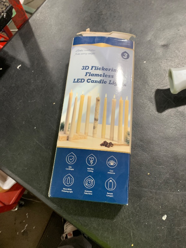 Photo 1 of Flameless Taper Candles with 3D Wick, 9.6" Real Wax LED Candles with Remote and Timer, 3 Pack Flickering Candlesticks Battery Operated, Classic Tall Taper Candles for Home, Wedding, Party, Ivory