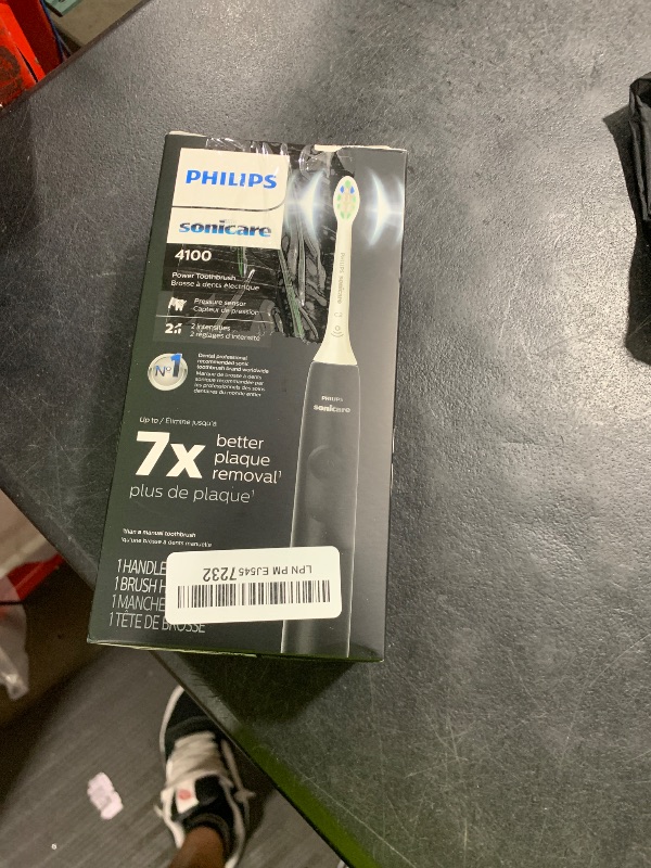 Photo 1 of Philips Sonicare 4100 Rechargeable Electric Toothbrush, with Pressure Sensor, 2 Intensity Settings, SmarTimer and QuadPacer, 14-Day Battery Life, Black, Model HX3681/24