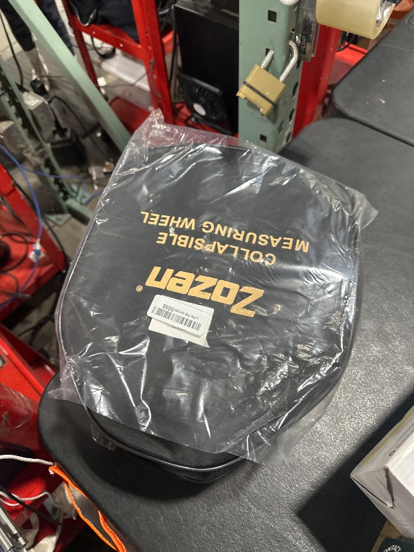 Photo 1 of Zozen Measuring Wheel in Feet and Inches, Mechanical/Double Collapsible/One Key to Reset/Kickstand to Keep Stand/Starting Point Arrow and Cloth Carrying Bag, 0-9,999 Ft Measure Wheel.