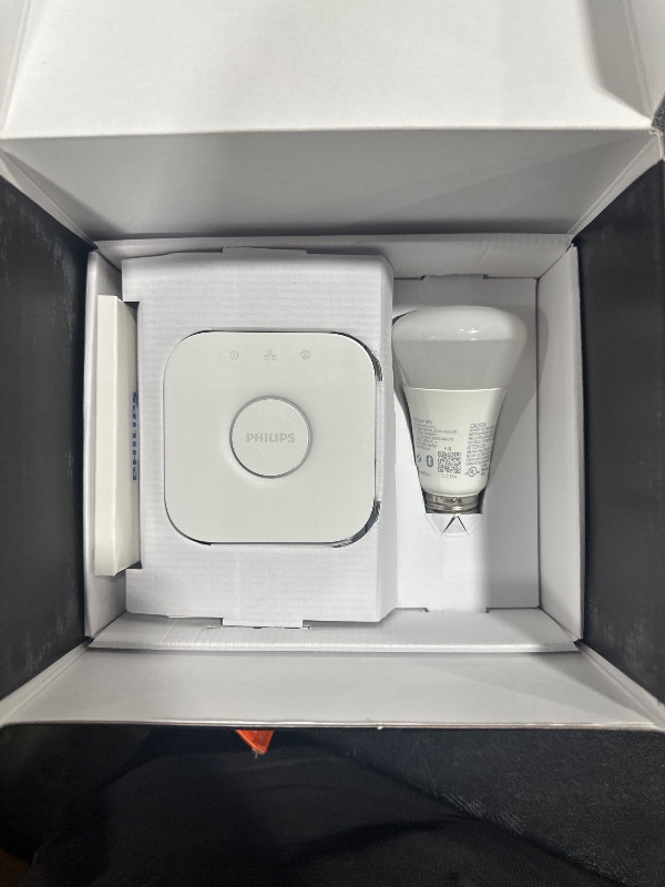 Photo 1 of Philips Hue Smart Light Starter Kit - Includes (1) Bridge and (4) 75W A19 E26 LED Smart White and Color Ambiance Bulbs - Control with App - Compatible with Alexa, Google Assistant, and Apple HomeKit