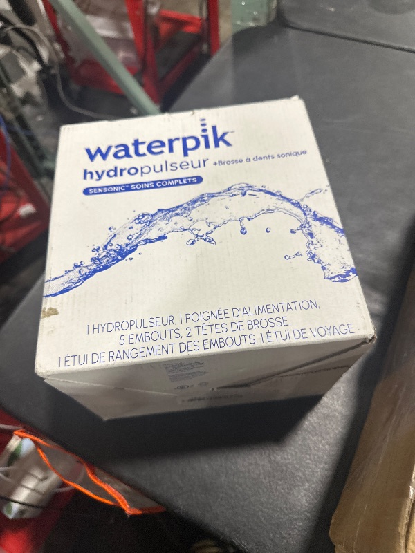Photo 1 of Waterpik Sensonic Complete Care Water Flosser and Rechargeable Electric Toothbrush Combo Set for Teeth Cleaning and Flossing, CC-04, White, Packaging May Vary
