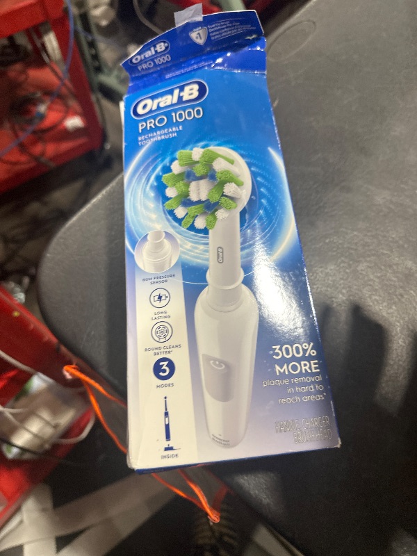 Photo 1 of Oral-B Pro 1000 Rechargeable Electric Toothbrush, White