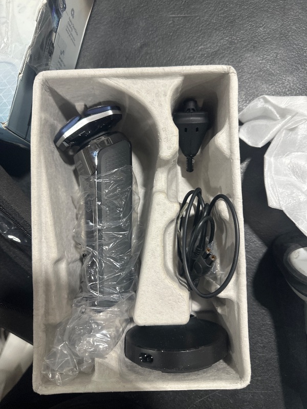 Photo 1 of Philips Norelco Shaver 7300, Rechargeable Wet & Dry Electric Shaver with SenseIQ Technology, Pop-up Trimmer, Charging Stand, Click-on Nose Trimmer, & Travel Case, S7887/92