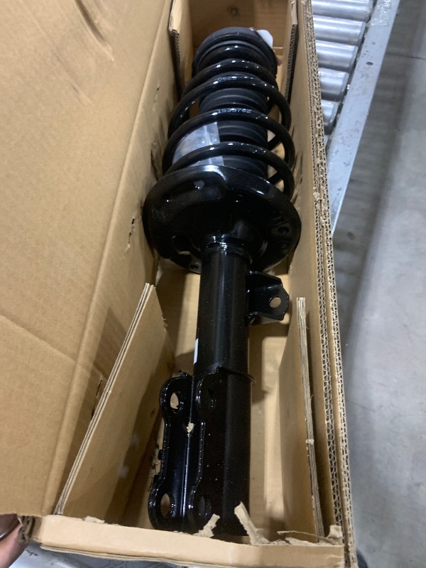 Photo 1 of TRQ Front Complete Quick Loaded Strut Spring Assembly LH Driver Side for Chevy Sonic
