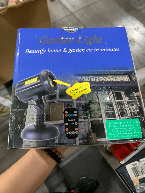 Photo 1 of Poeland Garden Lights Moving Laser Christmas Lights Firefly Star Projector for Home and Garden