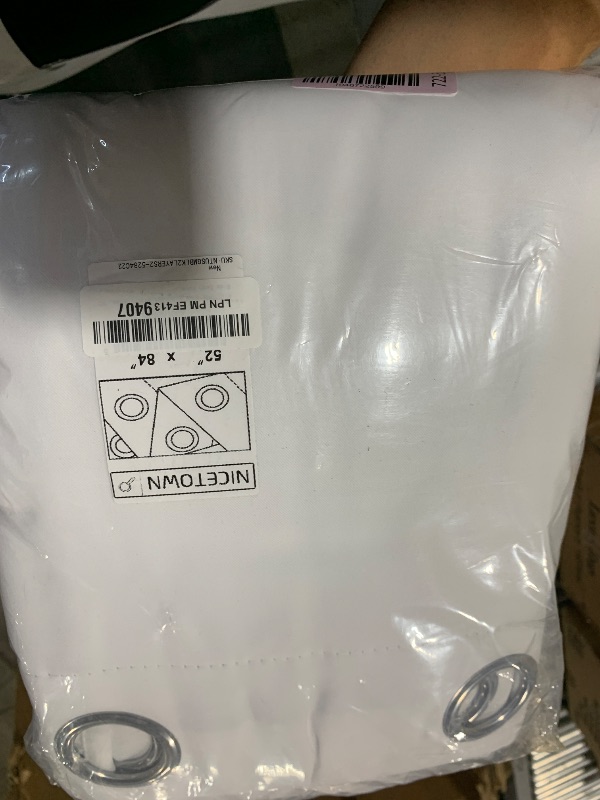 Photo 1 of NICETOWN 100% Blackout Window Curtain Panels, Cold and Full Light Blocking Drapes with Black Liner for Nursery, 84 inches Drop Thermal Insulated Draperies (White, 2 Pieces, 52 Wide Each Panel)