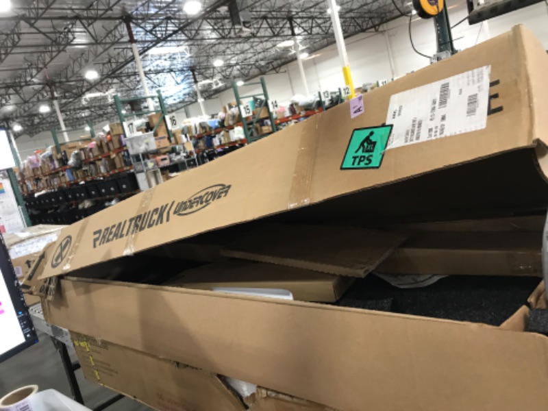 Photo 1 of RealTruck UnderCover Ultra Flex Hard Folding Truck Bed Tonneau Cover | UX82000 | Fits 2017 - 2025 Honda Ridgeline 5' Bed (60")