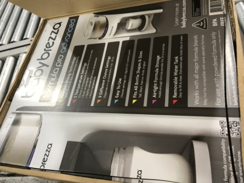 Photo 1 of Baby Brezza New and Improved Formula Pro Advanced Formula Dispenser Machine - Automatically Mix a Warm Formula Bottle Instantly - Easily Make Bottle with Automatic Powder Blending, White