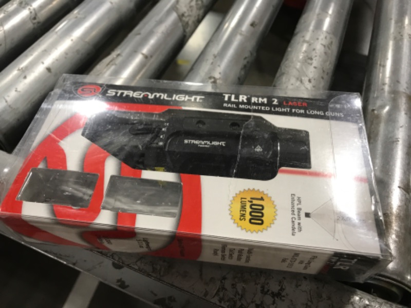 Photo 1 of Streamlight 69448 TLR RM 2 1000-Lumen Rail-Mounted Tactical Weapon Light with Integrated Red Aiming Laser, and Key Kit, Black
