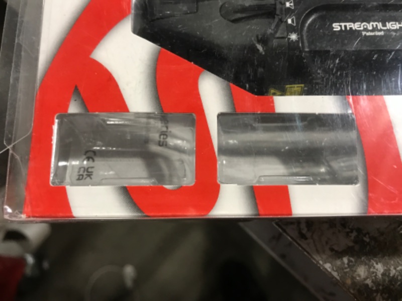 Photo 1 of Streamlight 69448 TLR RM 2 1000-Lumen Rail-Mounted Tactical Weapon Light with Integrated Red Aiming Laser, and Key Kit, Black