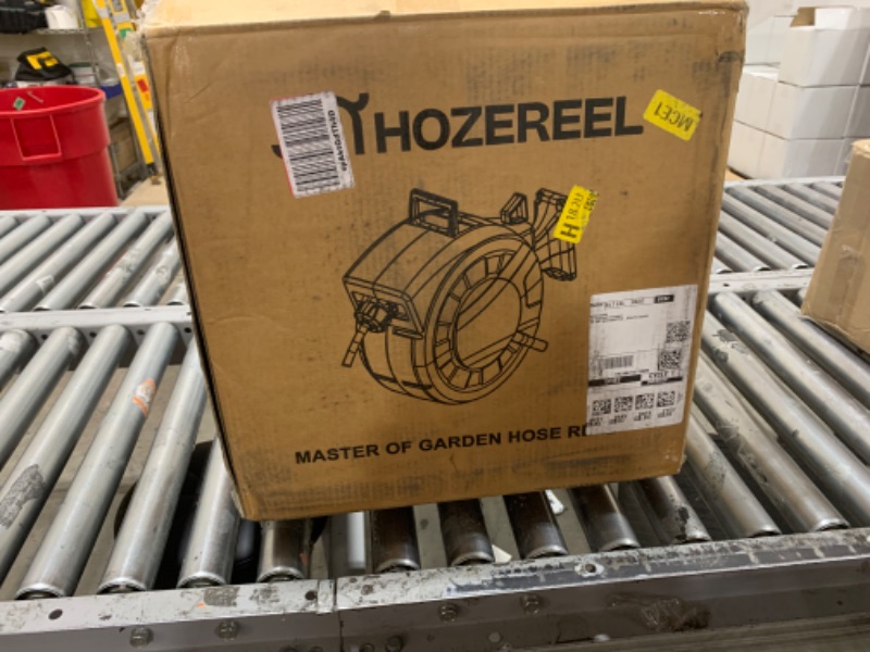 Photo 1 of 100ft Retractable Garden Hose Reel by HOZEREEL, 1/2" Hybrid Rubber Hose, Water Hose Reels Automatic Rewind Storage, 10 Patterns Nozzle Included (1/2" 100FT Black)