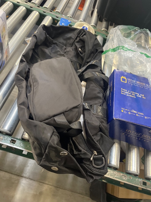 Photo 1 of Duffel bag and travel bag