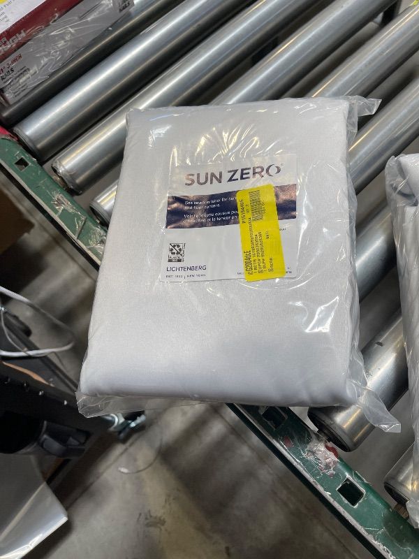 Photo 1 of Sun Zero Oslo Theater Grade Extreme 100% Blackout Rod Pocket Curtain Panel, 52" x 84", White