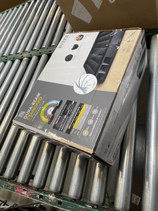 Photo 1 of INTEX 64147ED Dura-Beam Standard Pillow Rest Air Mattress: Fiber-Tech - Full Size - Built-in Electric Pump - 10in Bed Height - 600lb Weight Capacity