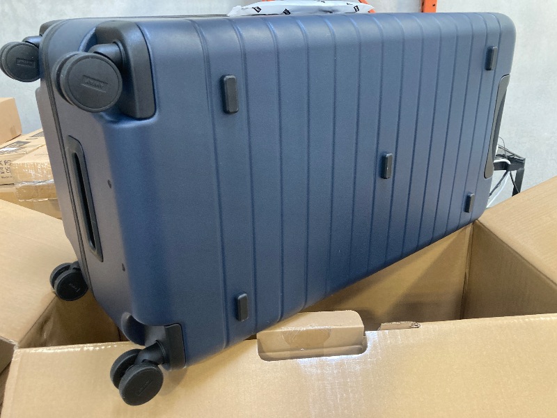 Photo 1 of Away Large Trunk Luggage, 31 Inch Hardside Suitcase with Spinner Wheels, Lightweight & Durable, TSA Lock, Ideal for Long Trips, Navy Blue