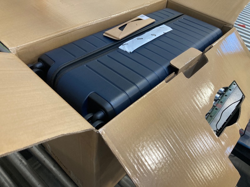 Photo 1 of Away Large Trunk Luggage, 31 Inch Hardside Suitcase with Spinner Wheels, Lightweight & Durable, TSA Lock, Ideal for Long Trips, Navy Blue