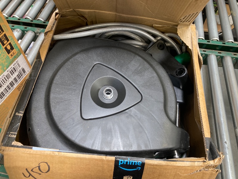 Photo 1 of Retractable Garden Hose Reel, 120Ft x 1/2" Durable Wall Mounted Water Hose Reel with 180¡ãSwivel Bracket, 9 Pattern Sprayer, 6Ft leader hose, Smooth Automatic Rewind, Any Length Lock.