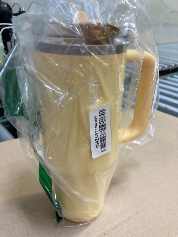 Photo 1 of Stanley Quencher ProTour Flip Straw Tumbler with Leakproof Lid 40 oz | Built-In Straw and Handle | Cup Holder Compatible for Travel | Insulated Stainless Steel Cup | BPA-Free | Butter Gloss