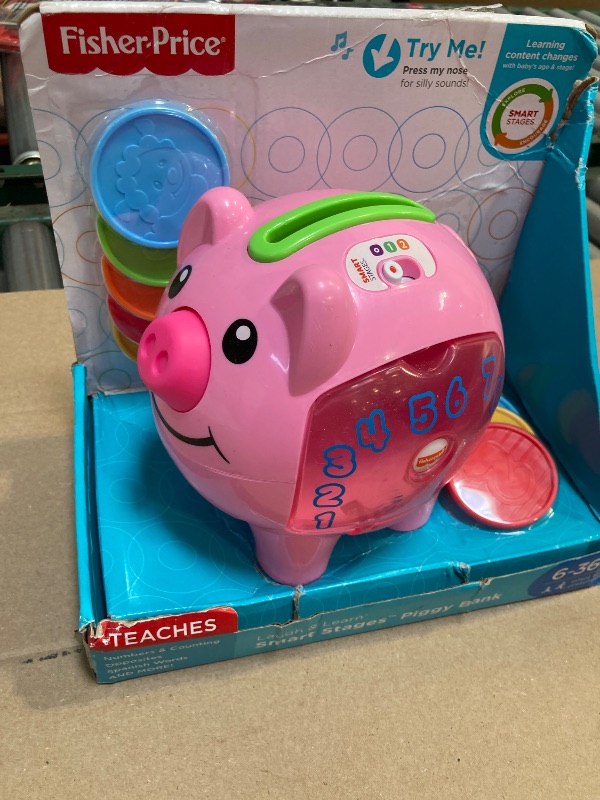 Photo 1 of Fisher-Price Baby & Toddler Toy Laugh & Learn Smart Stages Piggy Bank with Learning Songs & Phrases for Infants Ages 6+ Months