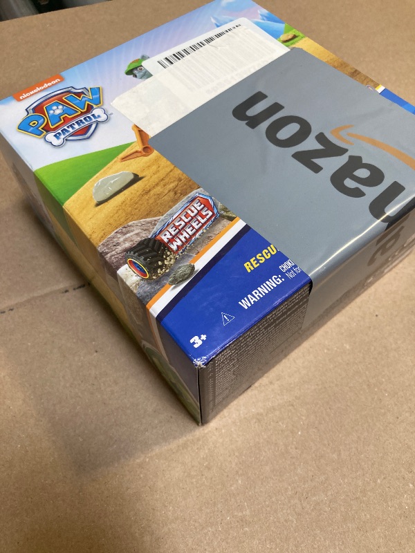 Photo 1 of Paw Patrol: Rescue Wheels Rocky’s Recycle Truck, Toy Truck with Projectile Launcher and Collectible Action Figure, Kids Toys for Boys & Girls Ages 3+