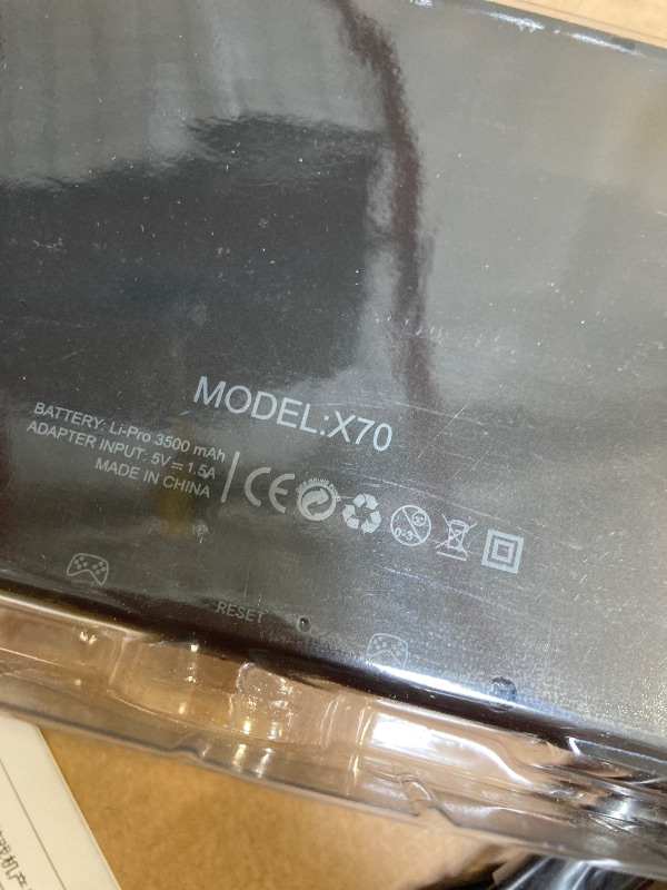 Photo 1 of X70 Handheld Game Console 7.0-in Retro Games Console Pad Style Built-in Battery with Screen Protector Liner Bag Black