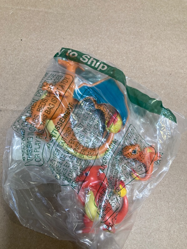 Photo 1 of Pokémon Select Evolution 3 Pack - Features 2-Inch Charmander, 3-Inch Charmeleon and 4.5-Inch Charizard Battle Figures