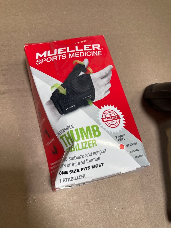 Photo 1 of MUELLER Sports Medicine Adjust-to-Fit Thumb Brace, Spica Splint, Thumb Pain Relief Stabilizer for Men and Women, Ideal for De Quervain's Tenosynovitis, Arthritis, Sprains, Fits Right or Left, Black, One Size