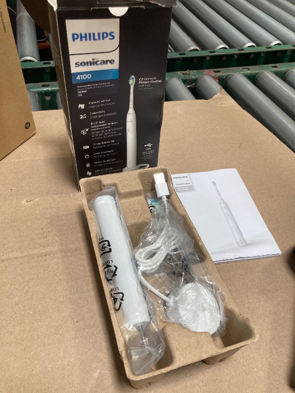 Photo 1 of Philips Sonicare 4100 Rechargeable Electric Toothbrush, with Pressure Sensor, 2 Intensity Settings, SmarTimer and QuadPacer, 14-Day Battery Life, White, Model HX3681/23