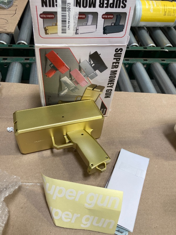 Photo 1 of Sopu Make it Rain Money Gun Paper Playing Spary Prop Cash Gun Party Supplies (Metallic Gold)