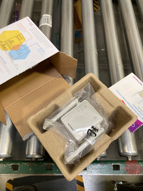 Photo 1 of NETGEAR Wi-Fi Range Extender EX6120 - Coverage Up to 1500 Sq Ft and 25 Devices with AC1200 Dual Band Wireless Signal Booster & Repeater (Up to 1200Mbps Speed), and Compact Wall Plug Design, White