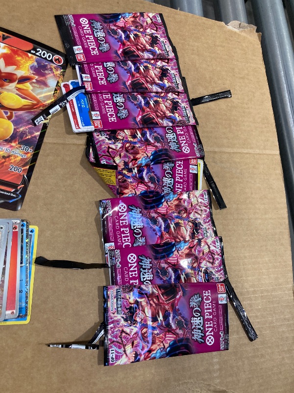 Photo 1 of LOT OF ASSORTED POKEMON/ONE PIECE CARDS/PACKS