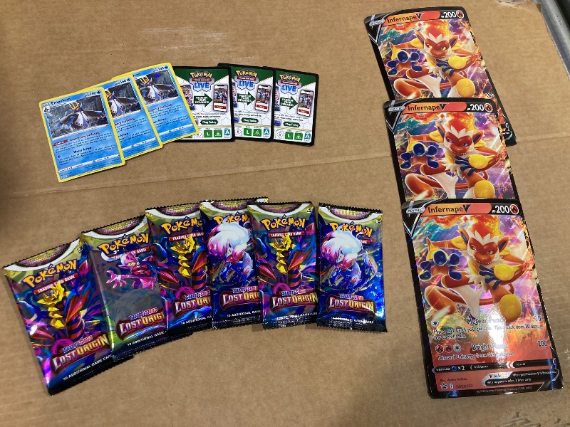 Photo 1 of LOT OF ASSORTED POKEMON CARDS/PACKS