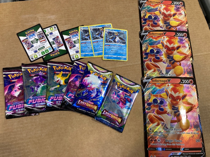 Photo 1 of LOT OF ASSORTED POKEMON CARDS/PACKS