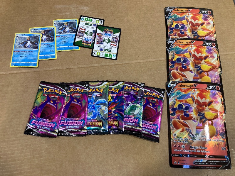 Photo 1 of LOT OF ASSORTED POKEMON CARDS/PACKS