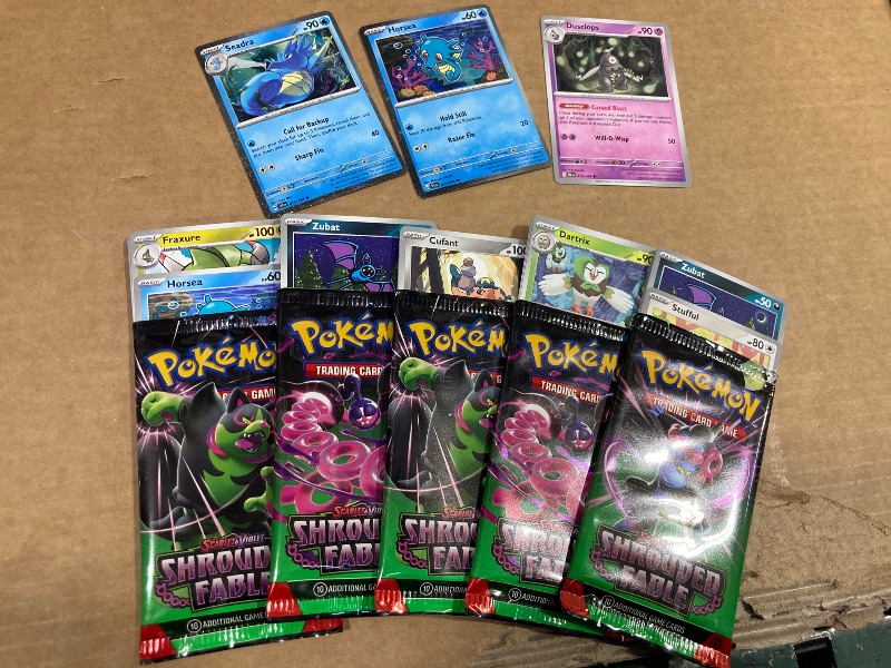 Photo 1 of LOT OF ASSORTED POKEMON CARDS/PACKS