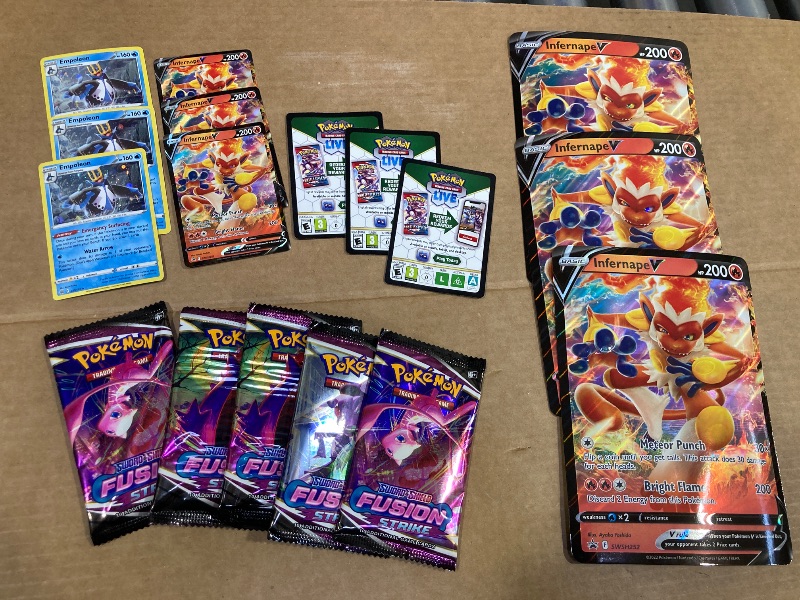 Photo 1 of LOT OF ASSORTED POKEMON CARDS/PACKS