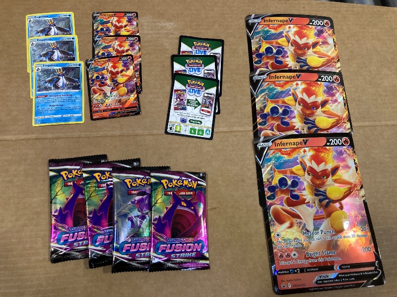 Photo 1 of LOT OF ASSORTED POKEMON CARDS/PACKS