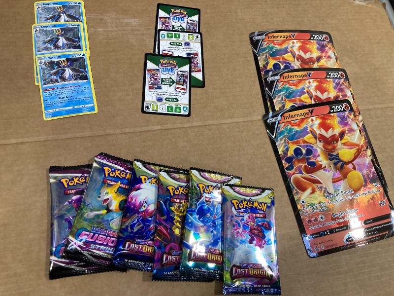 Photo 1 of LOT OF ASSORTED POKEMON CARDS/PACKS