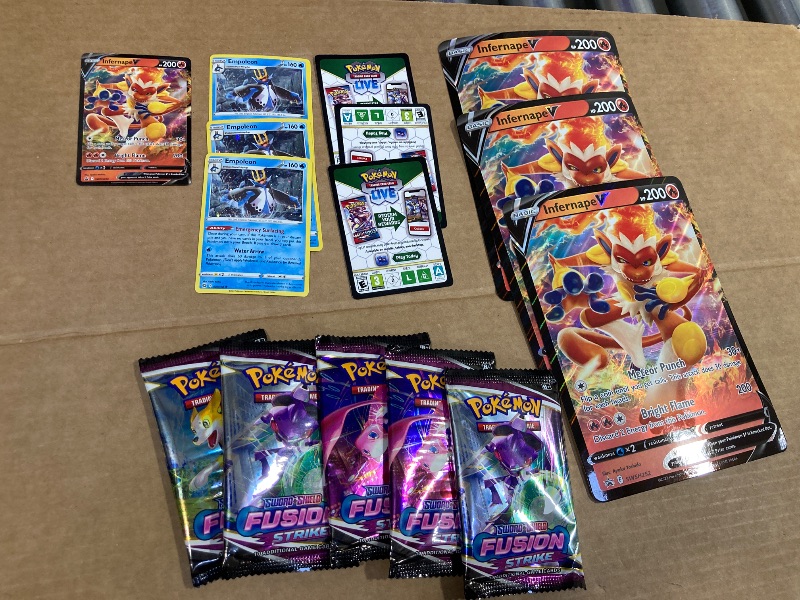 Photo 1 of LOT OF ASSORTED POKEMON CARDS/PACKS