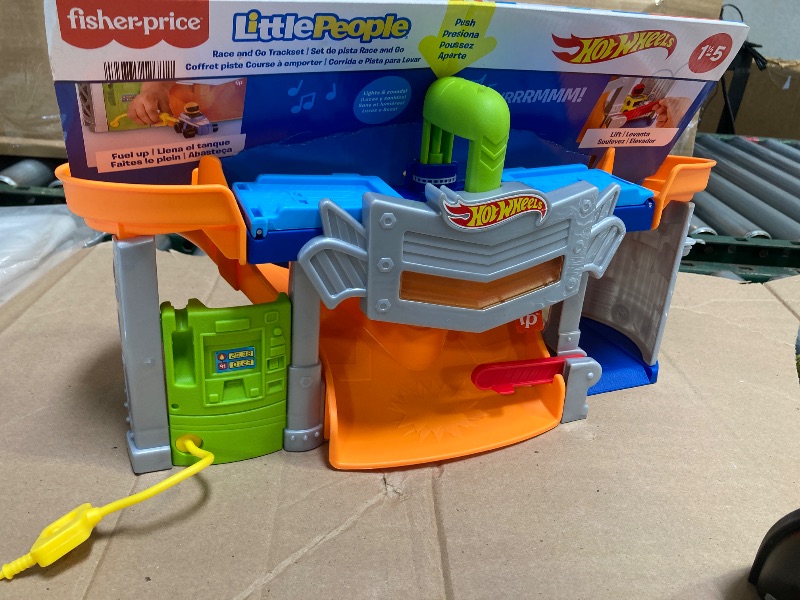 Photo 1 of Fisher-Price Little People Hot Wheels Toddler Toy Race and Go Track Set with Lights Sounds s for Pretend Play Kids Ages 18+ Months?