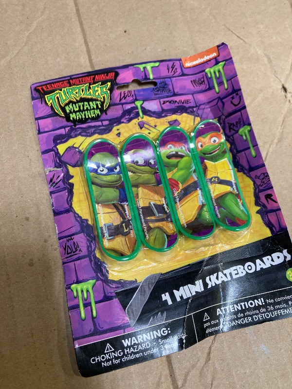 Photo 1 of TMNT Mutant Mayhem Mini Skateboard Favors (5" x 7") 4 Count - Assorted Party Favors for Kids - Ideal for Birthdays, Treat Bags & Gifts