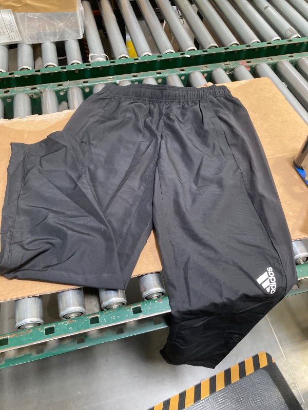 Photo 1 of adidas Men’s Woven Pant- MEDIUM
